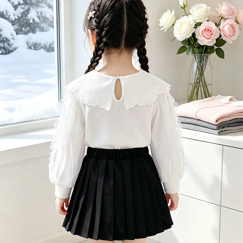 Mädchen elegante Bluse mit verzierter Rückenöffnung und Tüllärmeln Echo Archiv