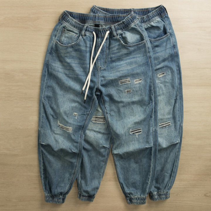 Herren lässige Jeans mit modischem Destroyed-Look Echoarchiv
