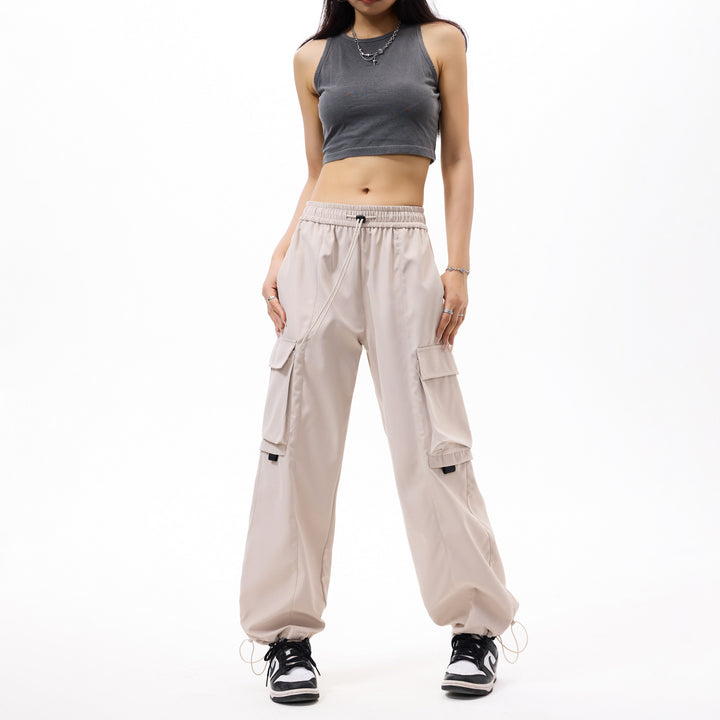 Herren weite Utility‑Cargohose im Baggy‑Cut mit Tunnelzugbund, großen Klappentaschen und verstellbarem Beinabschluss Echo Archiv