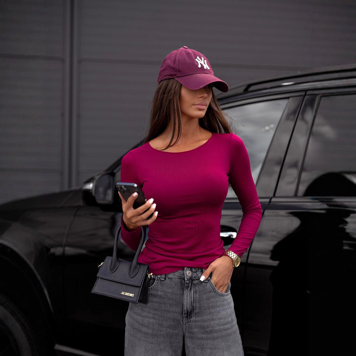 Damen figurbetontes Langarm-Shirt und weite High-Waist Denim-Jeans – Dénora