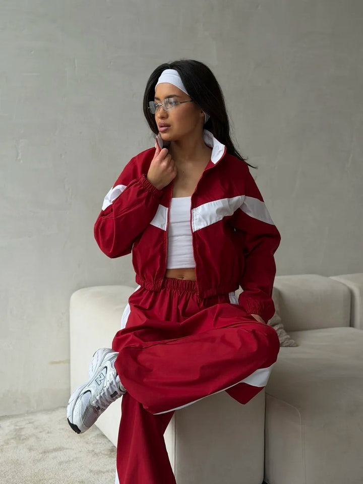 Damen Zweiteiliges Track-Set mit Cropped-Windjacke und weitem Jogger Echoarchiv
