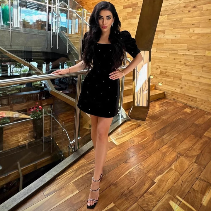 Damen Samtkleid mit Puffärmel und glitzernden Details Echo Archiv