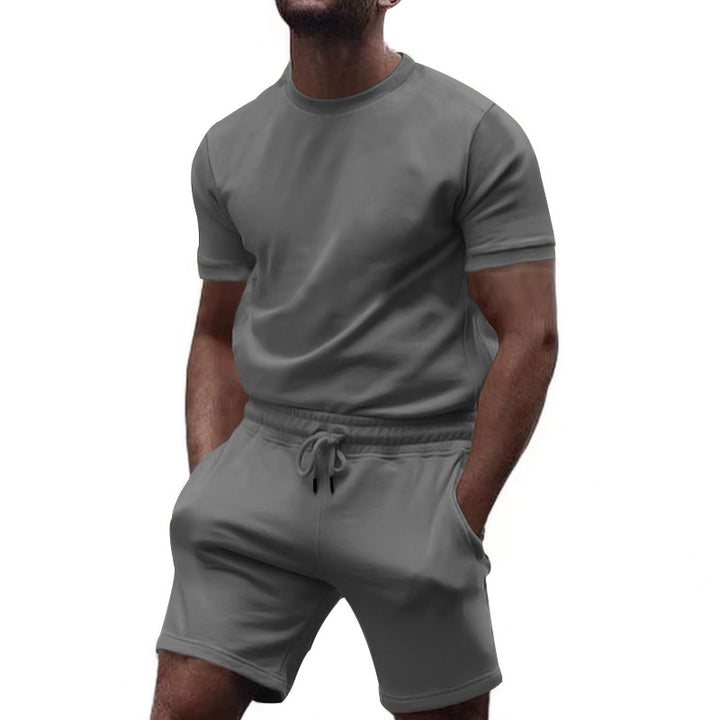 Herren nan minimalistisches Jersey-Ensemble mit bequemem Rundhalsshirt und elastischer Tunnelzug-Kurzhose Echo Archiv