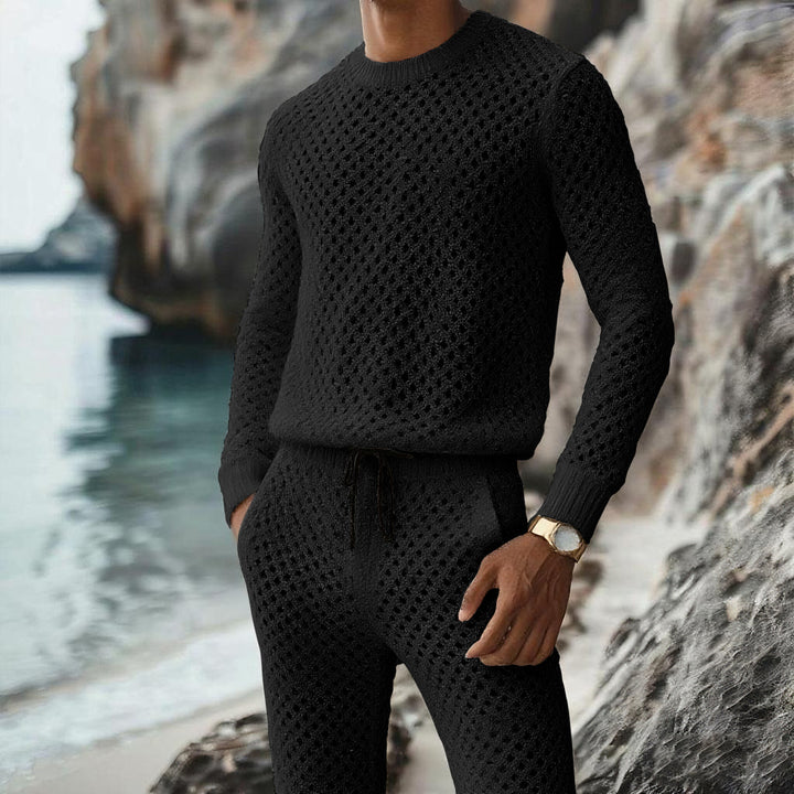 Herren Strukturstrick-Pullover mit feinmaschigem Lochmuster und Rundhals Echoarchiv