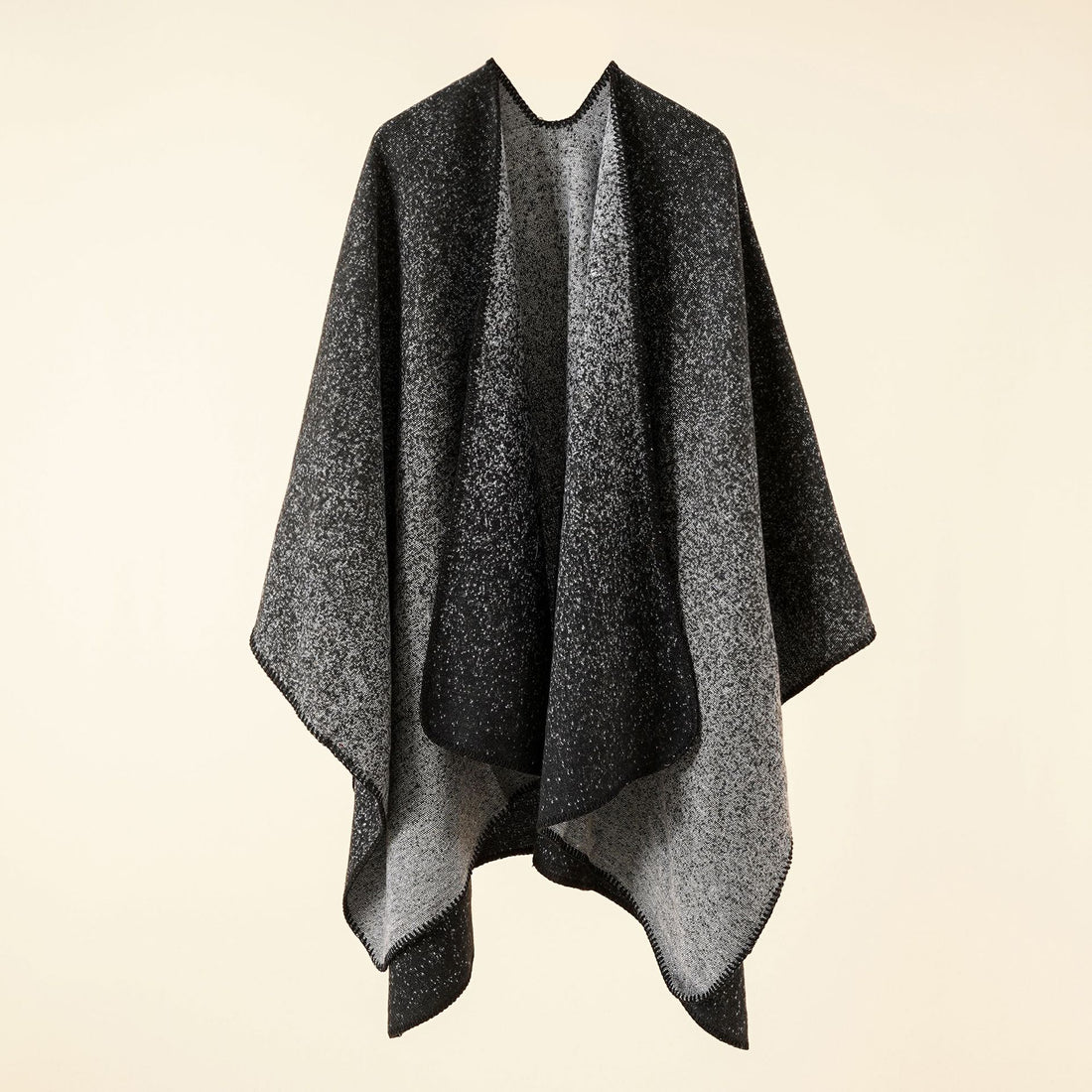 Damen Reversible Strickruana im Mélange‑Wollmix mit kontrastierter Kettelkante – Veloura