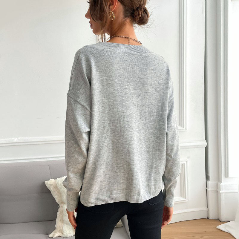Damen Feiner V‑Ausschnitt Strickpullover mit Stern‑Intarsien und überschnittener Schulter Echoarchiv
