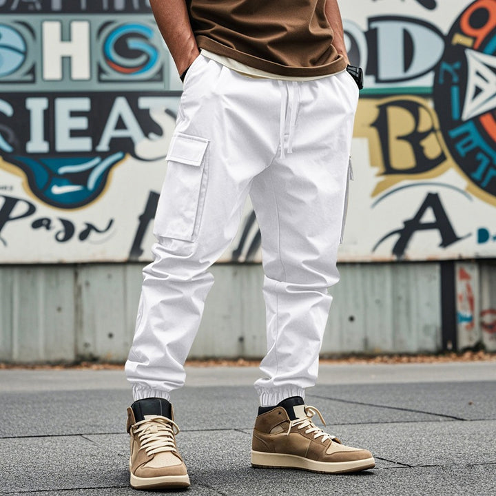Herren Tapered Cargo-Jogginghose mit Kordelzug, aufgesetzten Klappentaschen und elastischen Bündchen Echoarchiv