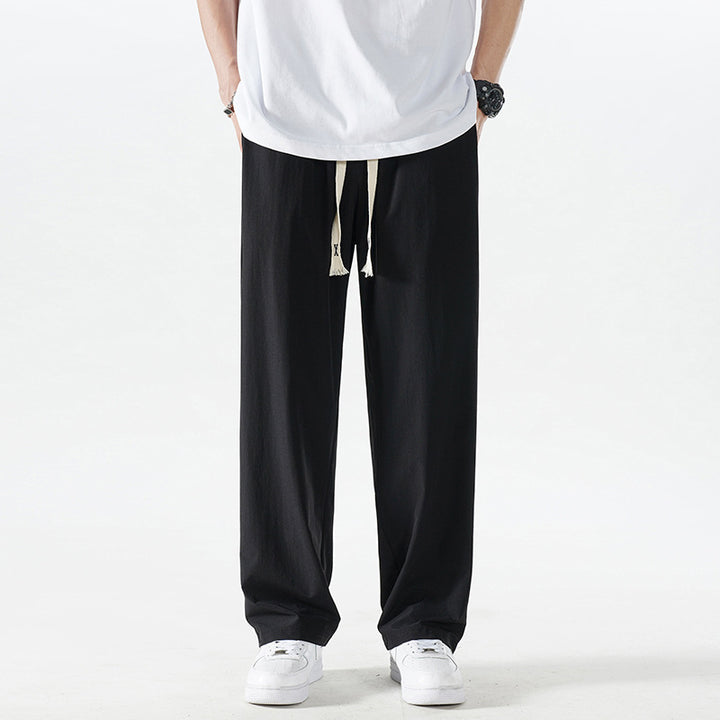 Herren Leichte Relax-Fit-Loungehose aus atmungsaktivem Jersey mit elastischem Tunnelbund, breitem Kordelzug & geripptem Beinabschluss Echoarchiv