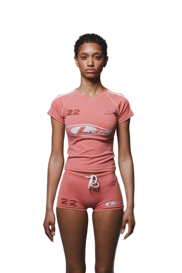 Damen Sport-Set mit figurbetonter Shorts und kurzärmeliger Oberteil Echo Archiv