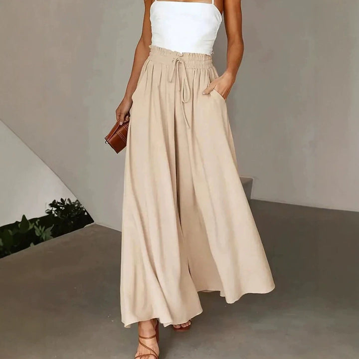Damen Weite Maxipalazzo-Hose mit Paperbag-Bund, Kordelzug und Seitentaschen – Avélisse