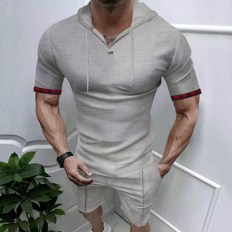Herren sportliches Kurzarm-Hemden- und Shorts-Set mit Kapuze und kontrastierenden Ärmelabschlüssen Echoarchiv