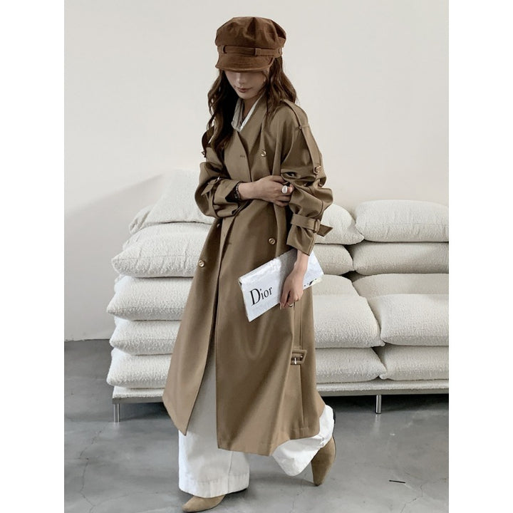 Damen Lang geschnittener Trenchcoat mit doppelreihiger Knopfleiste und verstellbaren Ärmelriegeln Echoarchiv