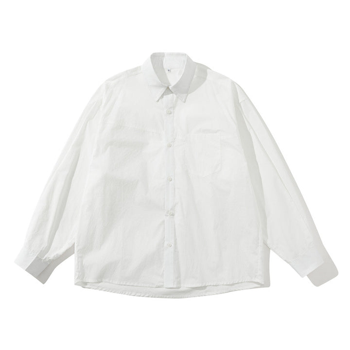 Unisex Leichtes Oversize-Hemd im Boxy-Cut mit Brusttasche und abgerundetem Saum Echoarchiv