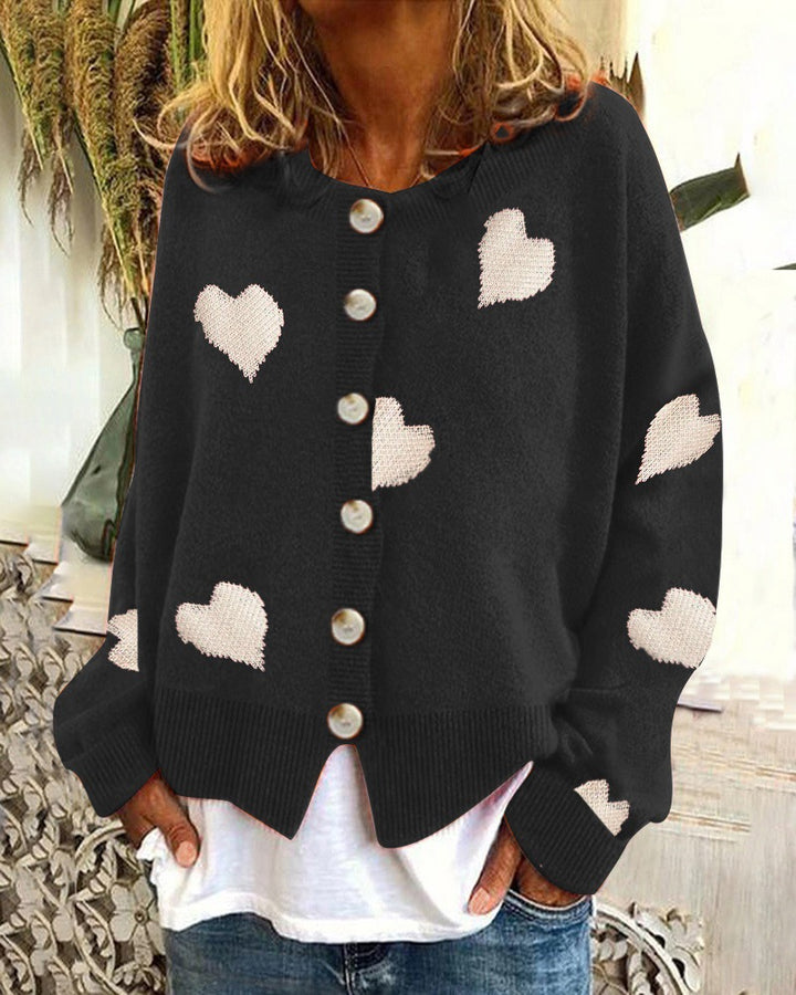 Damen Geknöpfter Oversize-Strickcardigan mit Herz-Jacquard und Perlmuttknöpfen Echo Archiv