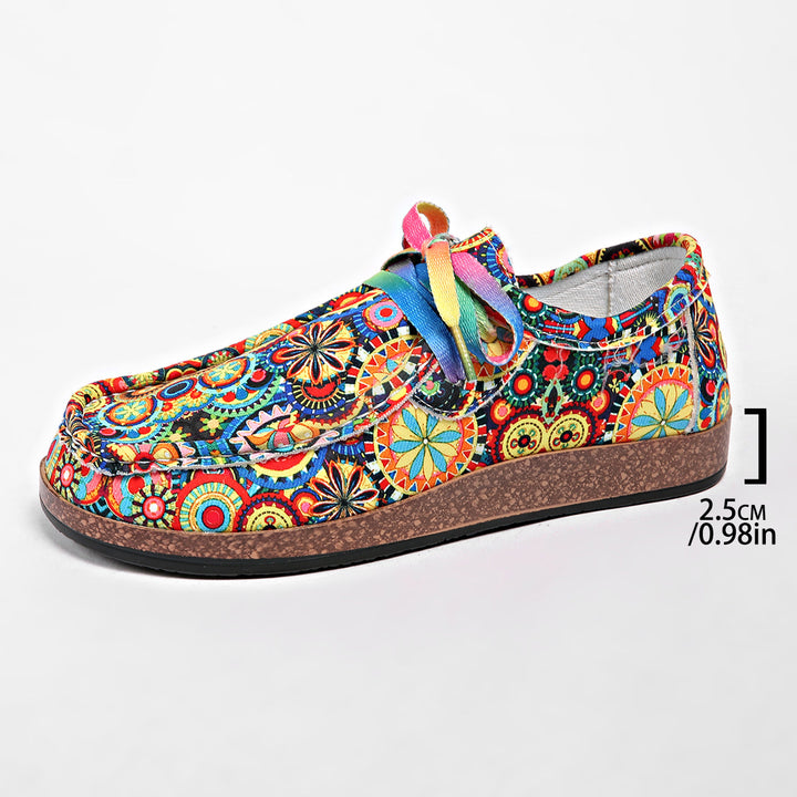 Damen Bequeme Plateau-Slipper im Ethno‑Print mit Korkoptik‑Sohle Echo Archiv