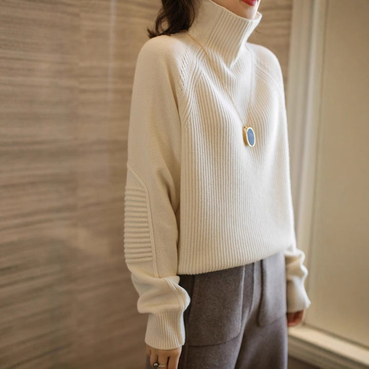 Damen Rollkragenpullover aus feinem Rippstrick mit Raglanärmeln und legerer Silhouette Echoarchiv