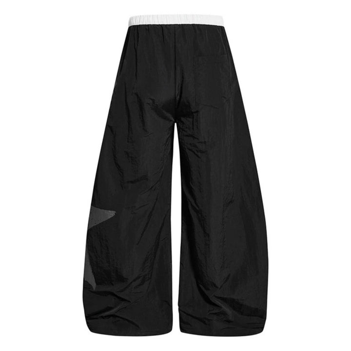 Damen Weite Palazzo-Hose mit Tunnelzugbund und großflächigem Statement-Print Echoarchiv