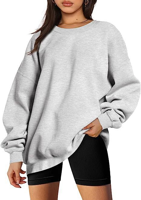 Damen nan Oversize-Sweater mit tiefem Schulterfall und gerippten Bündchen Echo Archiv