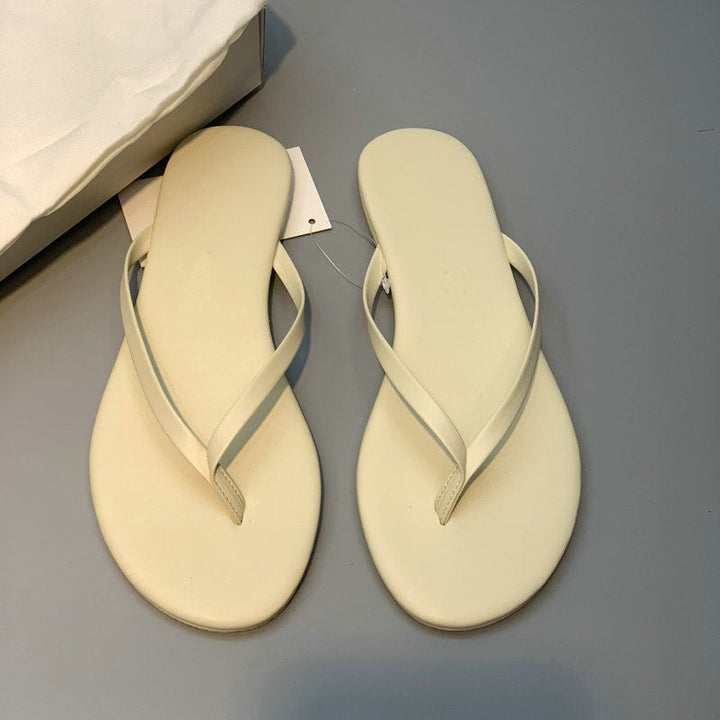 Damen stilvolle Flip-Flops mit glänzendem Riemendesign Echoarchiv