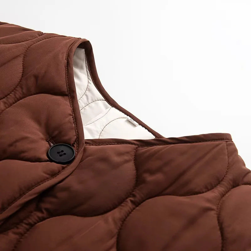 Damen gesteppte Übergangsjacke mit organischer Wellensteppung, Knopfleiste und eingesetzten Schrägtaschen – Célinea