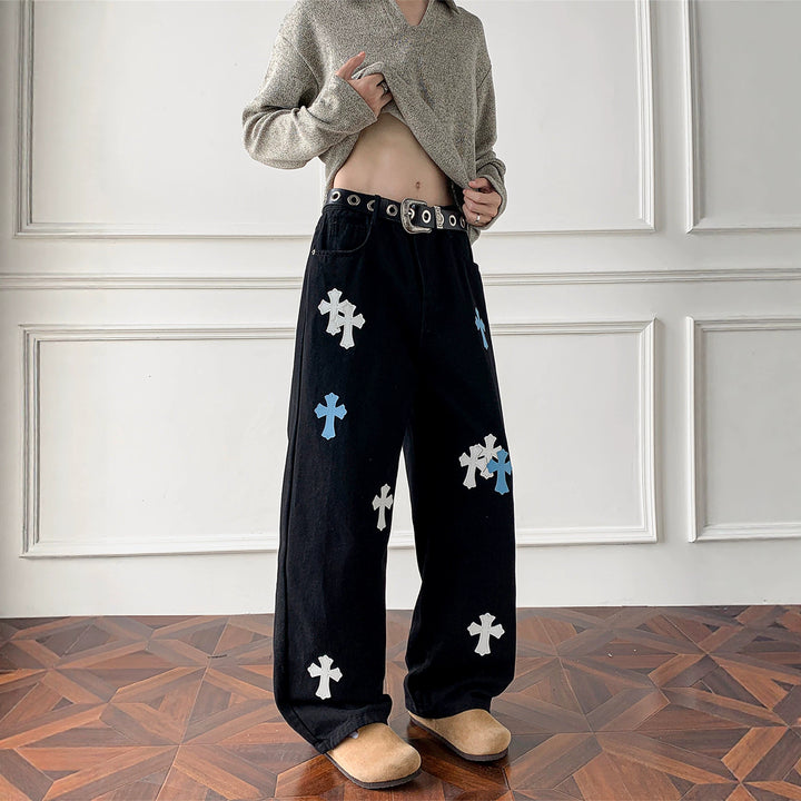 Damen Weitgeschnittene Denim-Hose mit kreativem Kreuzdesign Echoarchiv