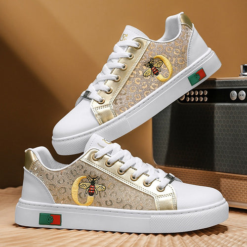 Damen verzierte Low-Top Sneaker mit Bienen-Stickerei und goldener Animal-Print-Optik Echo Archiv
