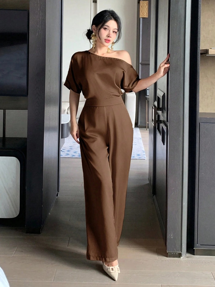 Damen Ein Schulter Jumpsuit mit weitem Bein und elegantem Schnitt Echo Archiv