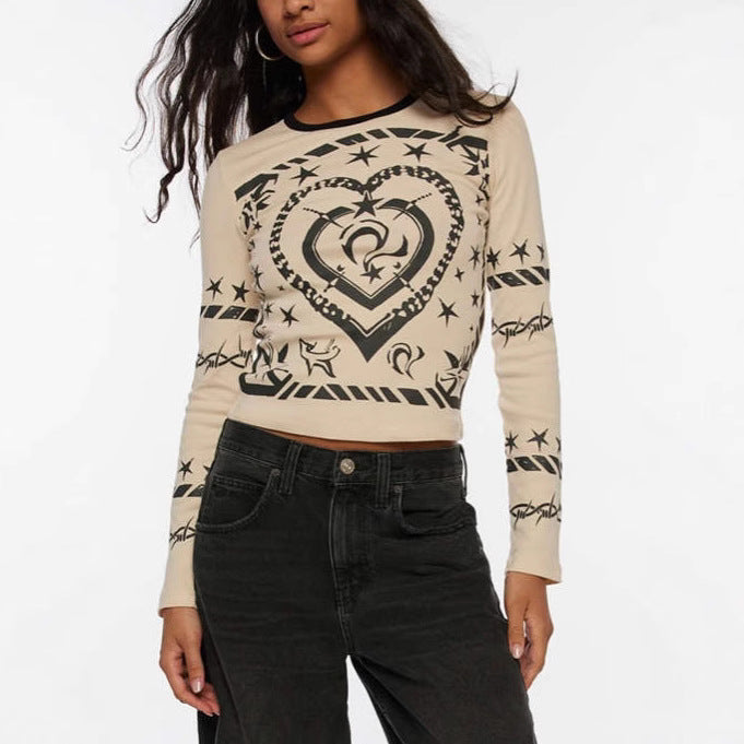 Damen Cropped-Langarmshirt mit figurbetontem Schnitt und Allover-Herzprint – Avérine