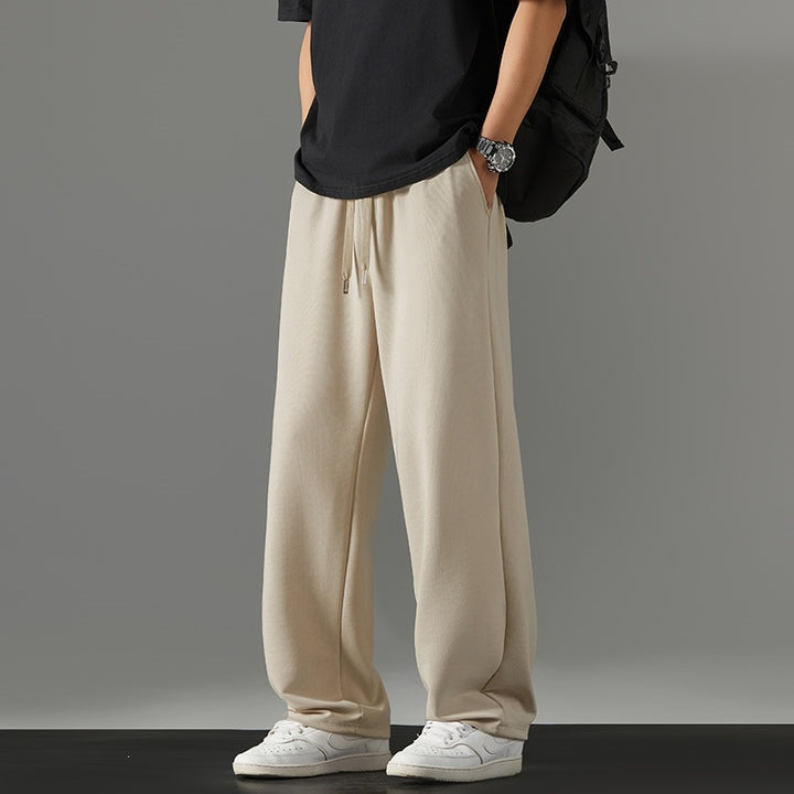 Herren weite Relaxed-Jogginghose aus French-Terry mit Kordelzug, elastischem Bund & geradem Bein Echoarchiv
