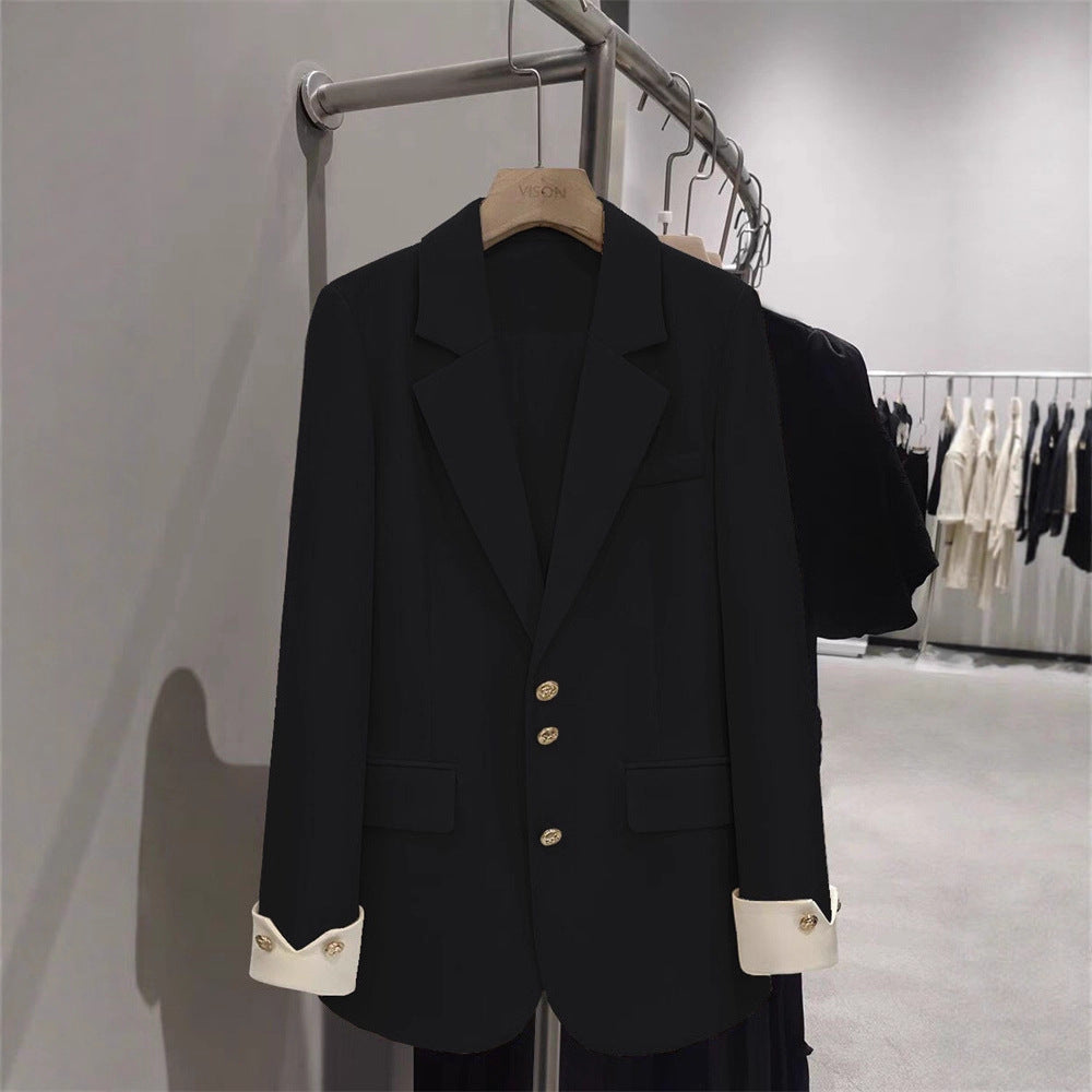Damen Eleganter Blazer mit goldenen Knopfdetails Echo Archiv