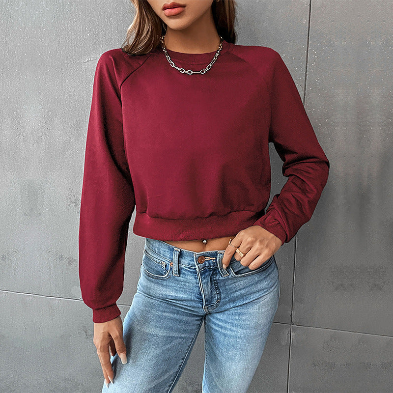 Damen Kurzes minimalistisches Sweatshirt mit Raglanärmeln und geripptem Saum Echoarchiv