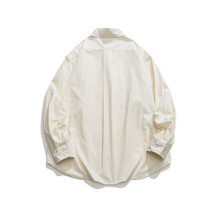 Unisex Oversized Hemdjacke mit seitlichen Zierknopfreihen und gerundetem Saum Echoarchiv