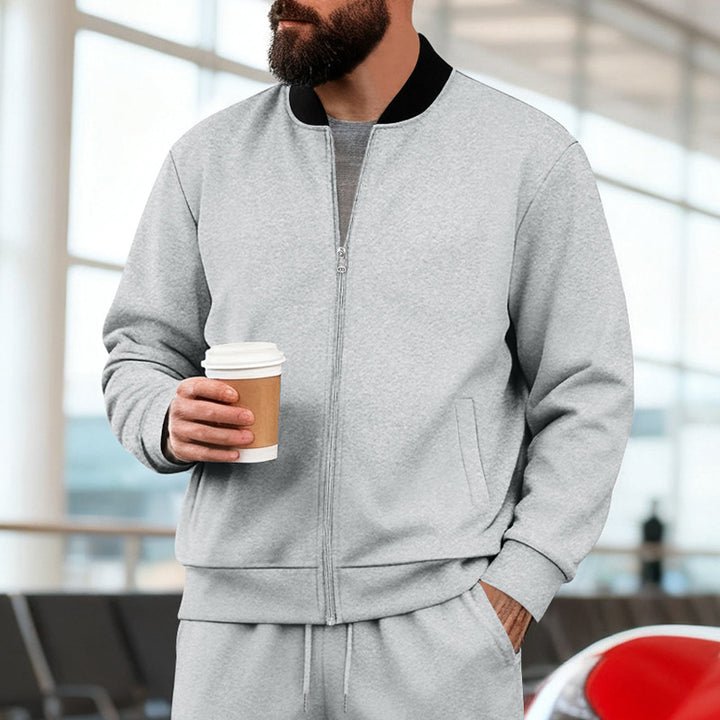 Herren nan urbane Sweat-Trackjacke mit Stehkragen verdecktem Reißverschluss elastischen Rippbündchen und Eingrifftaschen Echo Archiv