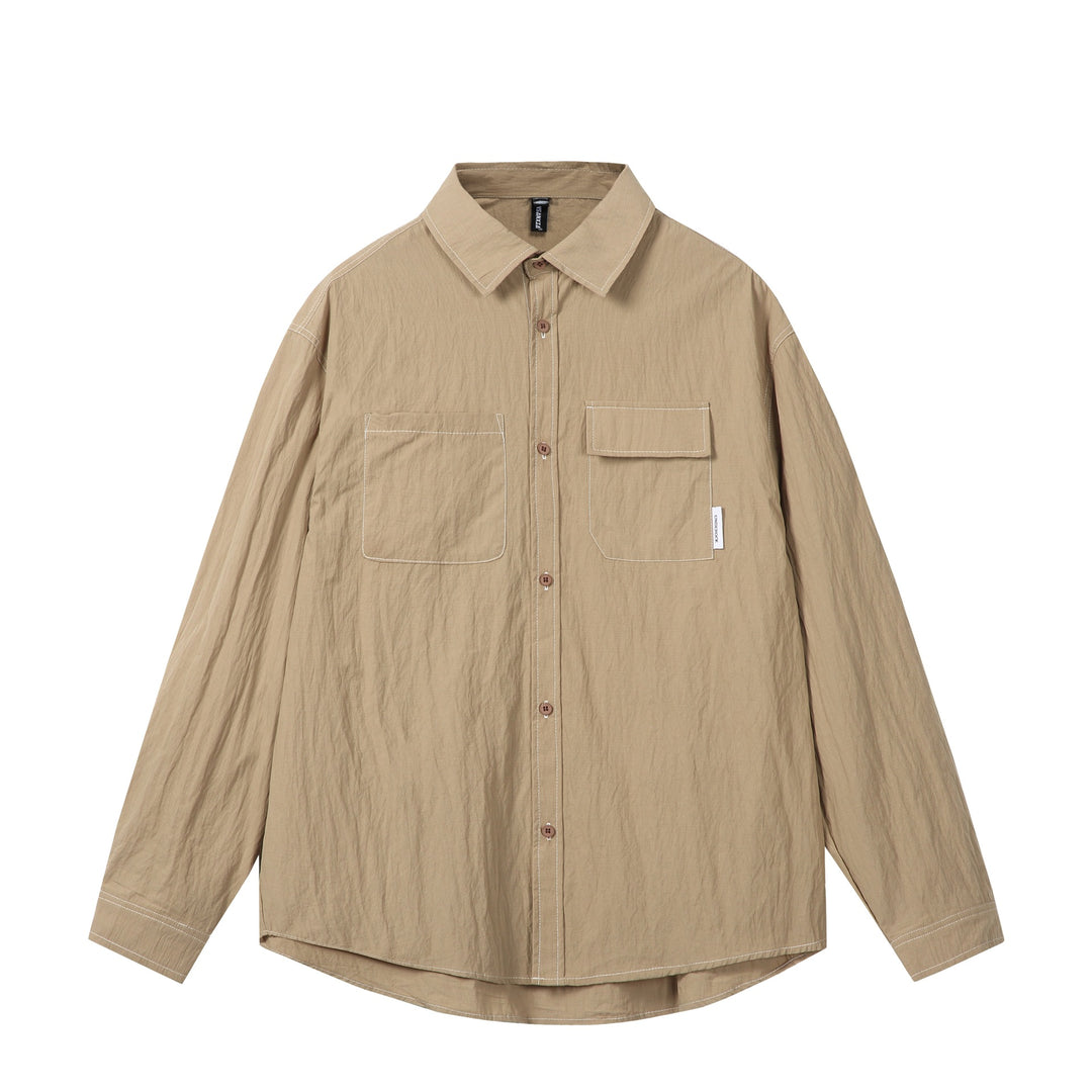 Unisex Oversize-Hemdjacke mit markanten Kontrastnähten und aufgesetzten Brusttaschen Echoarchiv