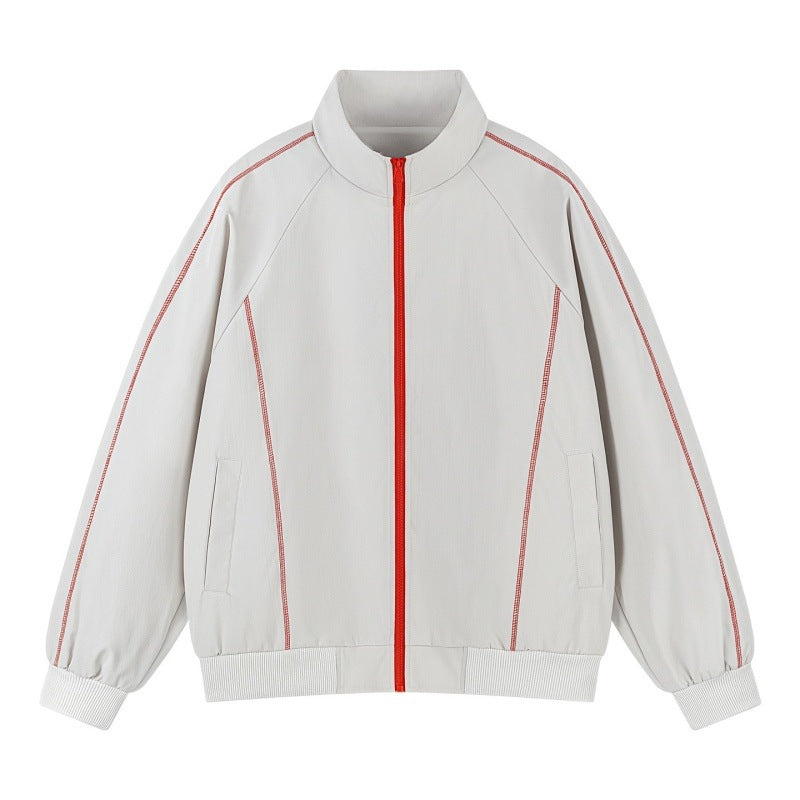 Herren Leichte Raglan-Bomberjacke mit kontrastierenden Flatlock‑Nähten und Stehkragen Echoarchiv