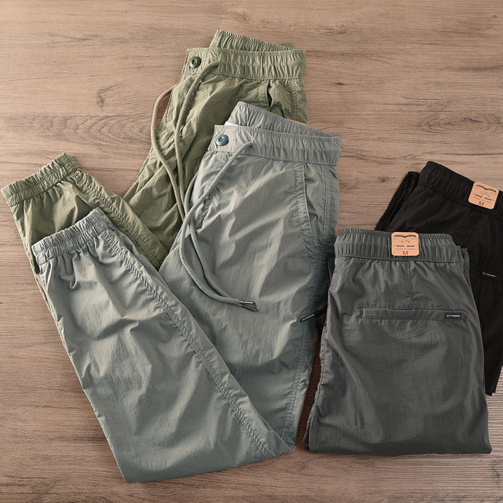 Herren lässige Jogginghose mit elastischem Bund und seitlichen Taschen Echoarchiv