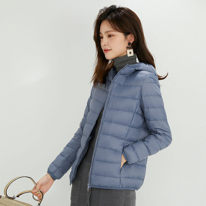 Damen Ultraleichte gesteppte Kapuzenjacke mit ultraflacher Thermowatte Echoarchiv
