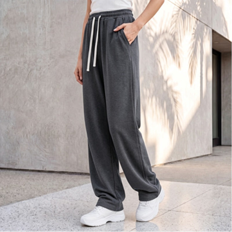 Damen nan weite Loungepalazzo-Hose mit hohem Komfortbund, Kordelzug, seitlichen Eingrifftaschen und dekorativer Seitennaht Echo Archiv