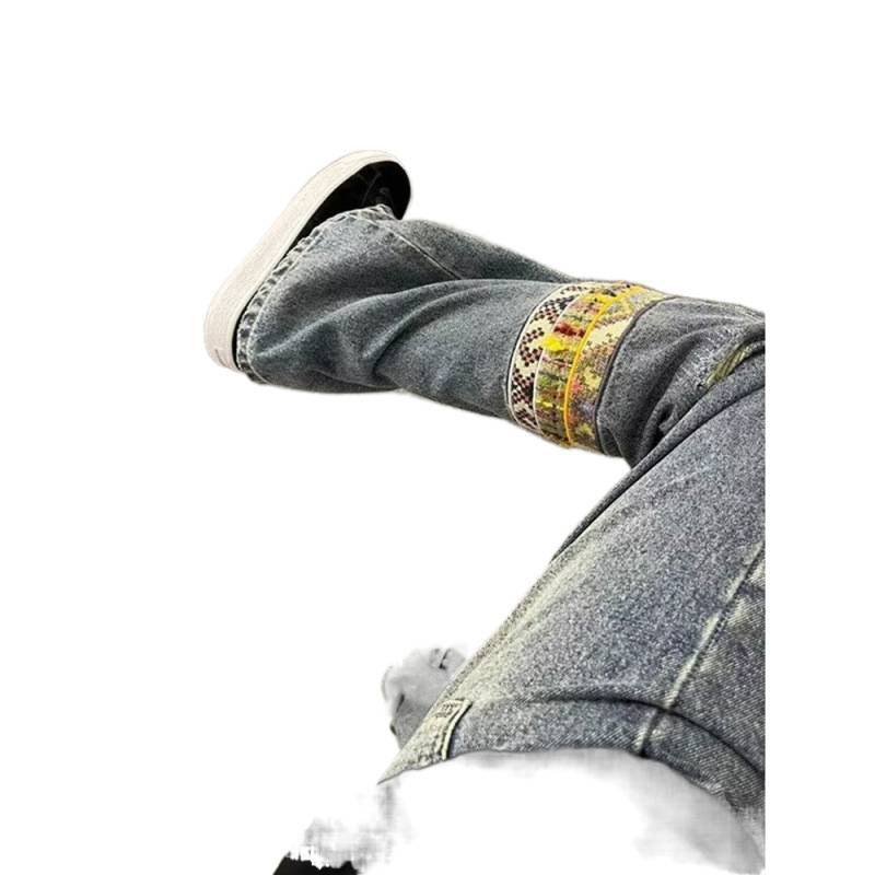 Herren modische und lässige Jeans mit kreativen Zierdetails Echoarchiv