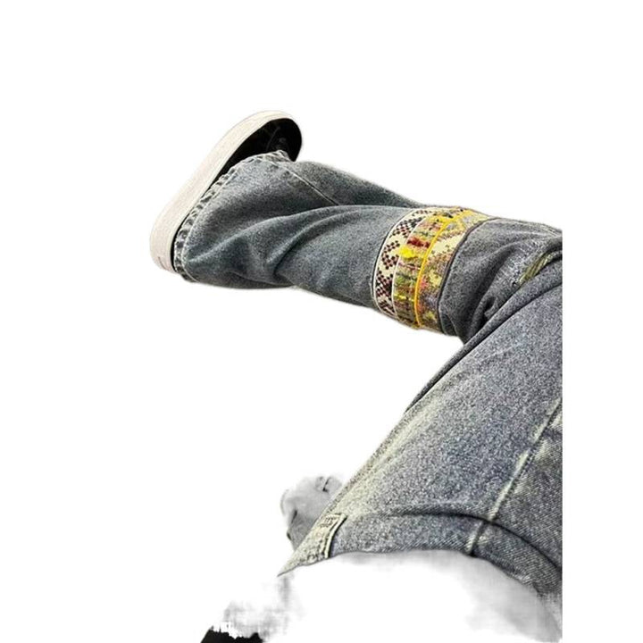 Herren modische und lässige Jeans mit kreativen Zierdetails Echoarchiv