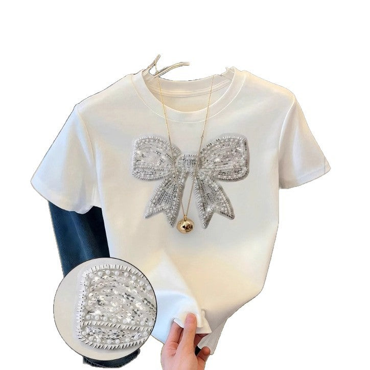 Damen T-Shirt mit glitzerndem Schleifenmotiv und feiner Sticktechnik Echo Archiv