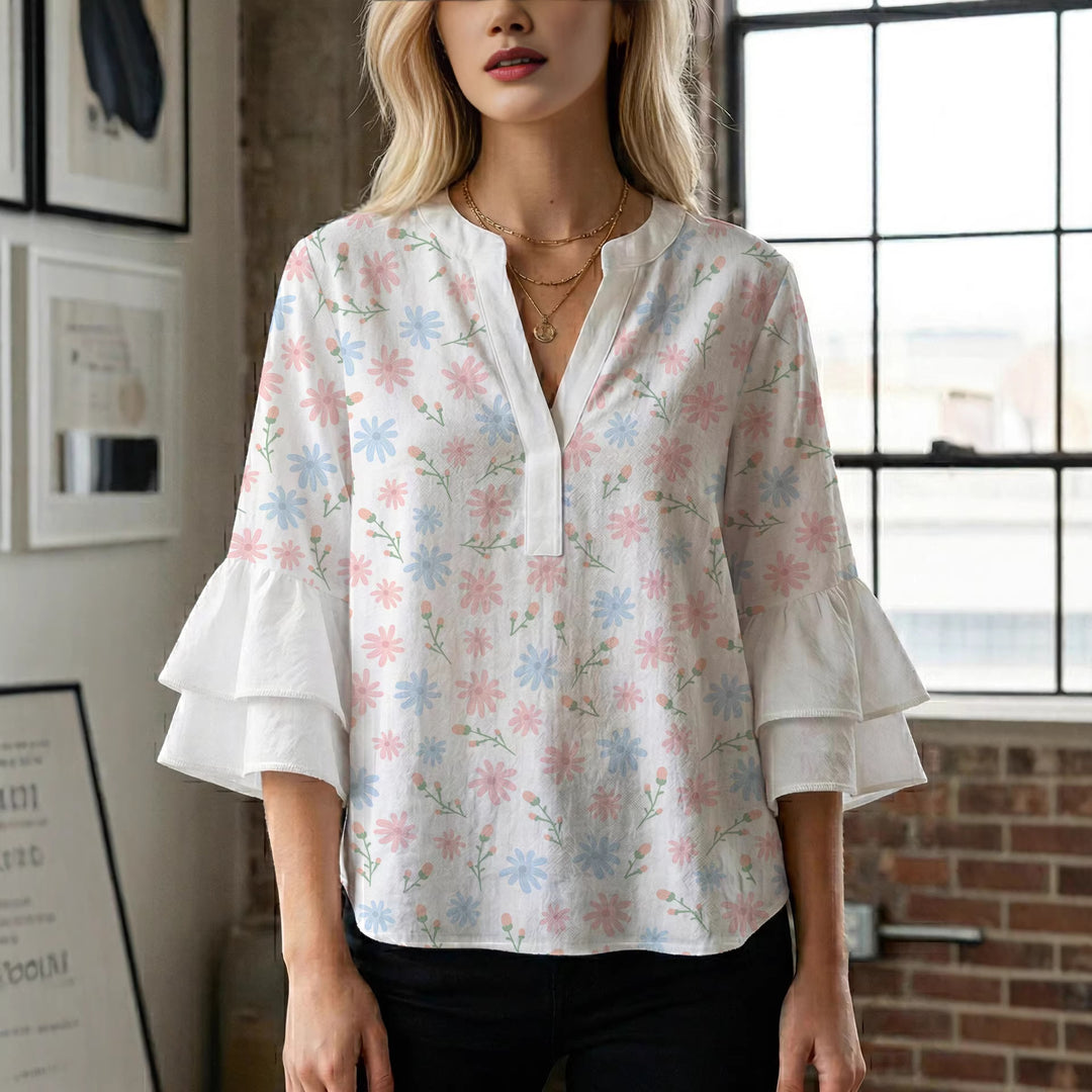 Damen Bluse mit voluminösen Flügelärmel und intensivem Blattmuster Echo Archiv