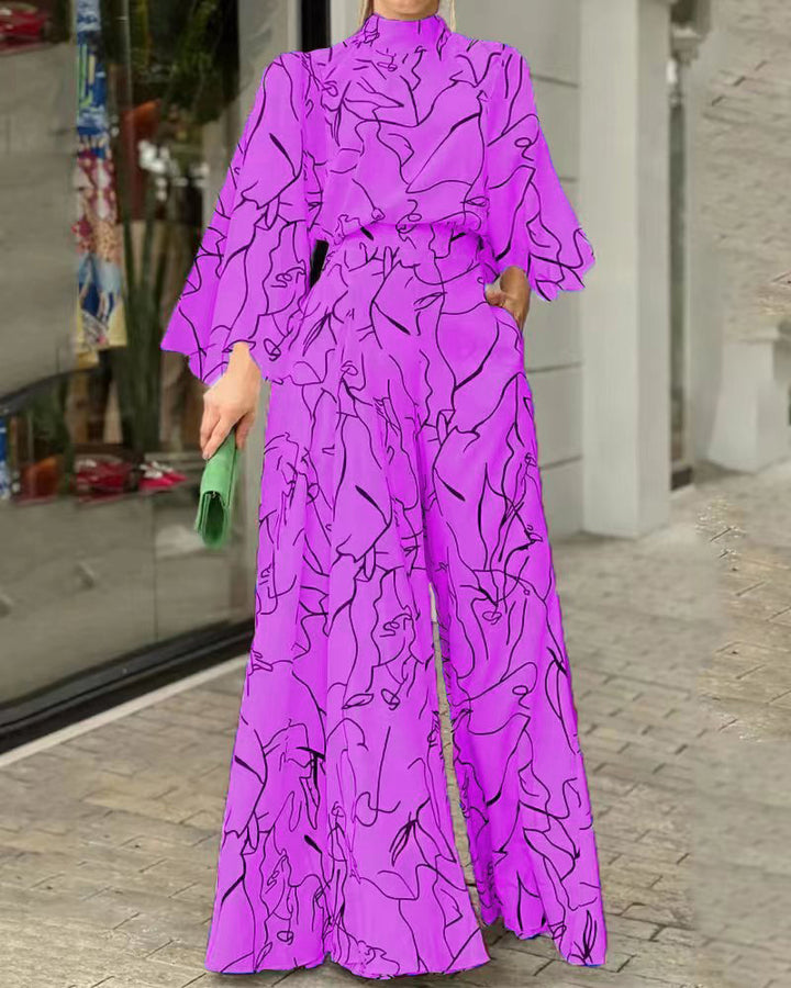Damen Eleganter Longline Jumpsuit mit Stehkragen, Ballonärmeln und Seitentaschen Echoarchiv