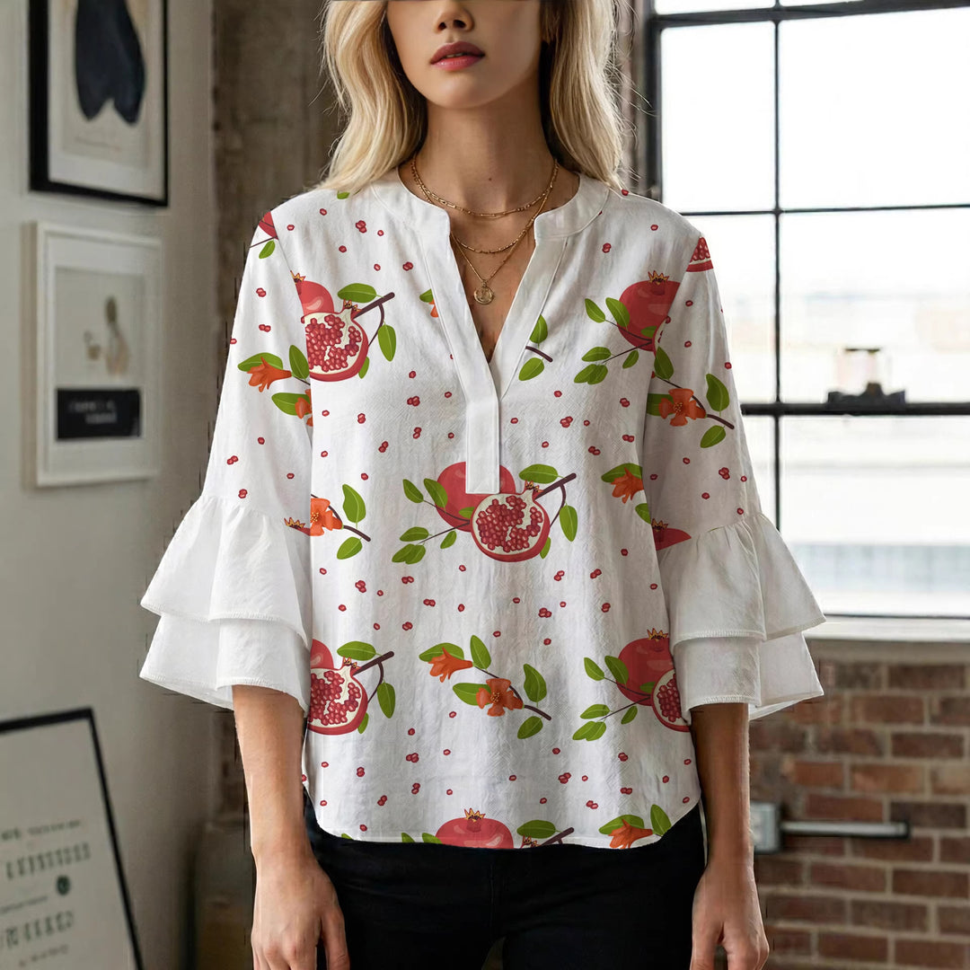 Damen Bluse mit voluminösen Rüschenärmeln und modernem Motiv Echo Archiv