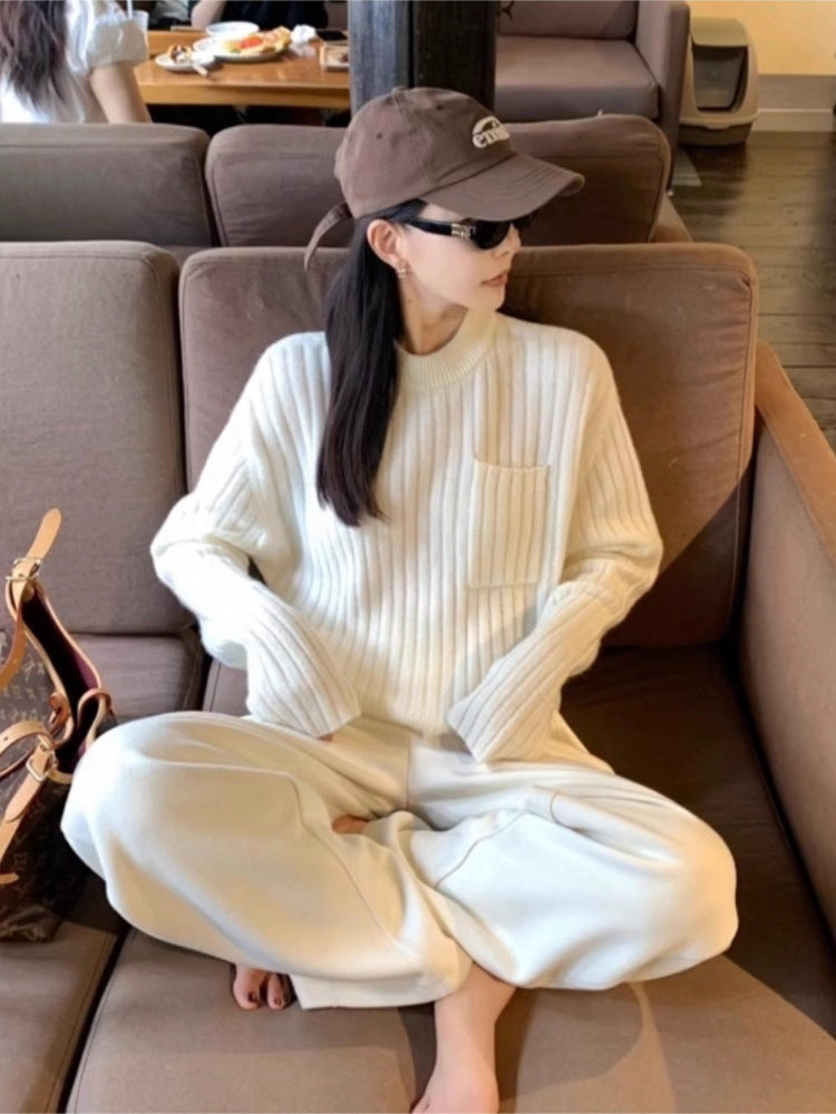 Damen Oversize-Rippenstrickpullover mit Brusttasche und Mockneck Echoarchiv