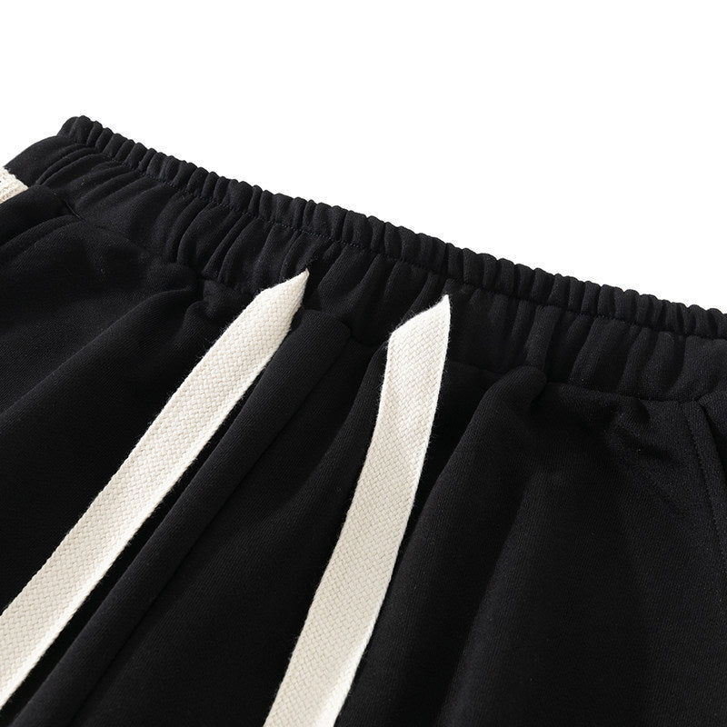 Herren Entspannte Jogginghose mit Seitensaum‑Kontraststreifen, elastischem Bund & Kordelzug Echo Archiv