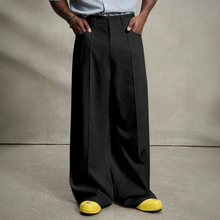 Herren nan weite Bundfaltenhose mit hoher Bundhöhe, präzisen Bügelfalten und seitlichen Eingrifftaschen Echoarchiv
