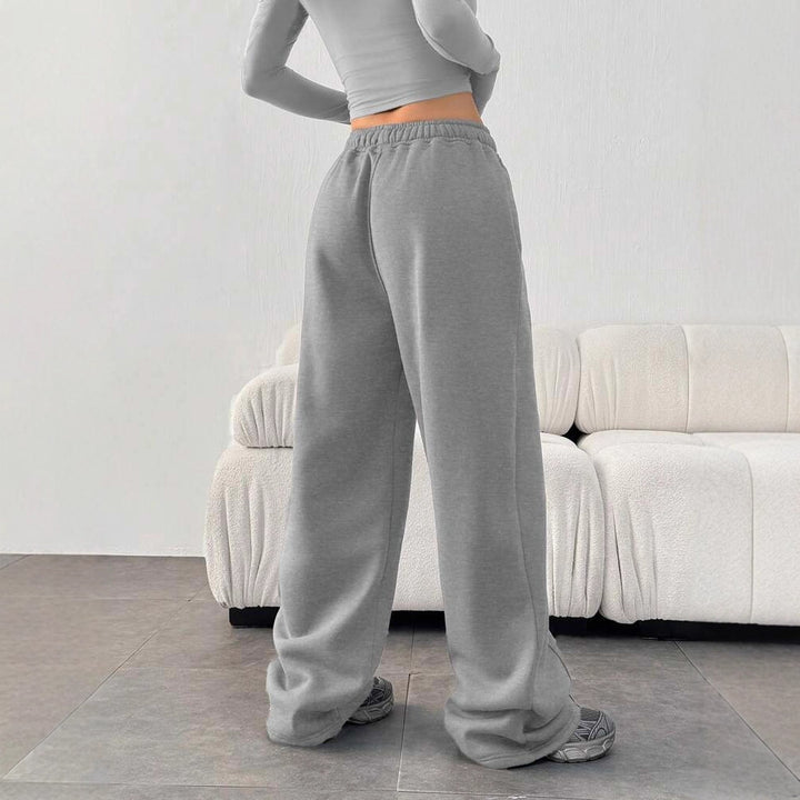 Damen nan enges Cropshirt und weite High-Waist Jogginghosen-Set Echo Archiv