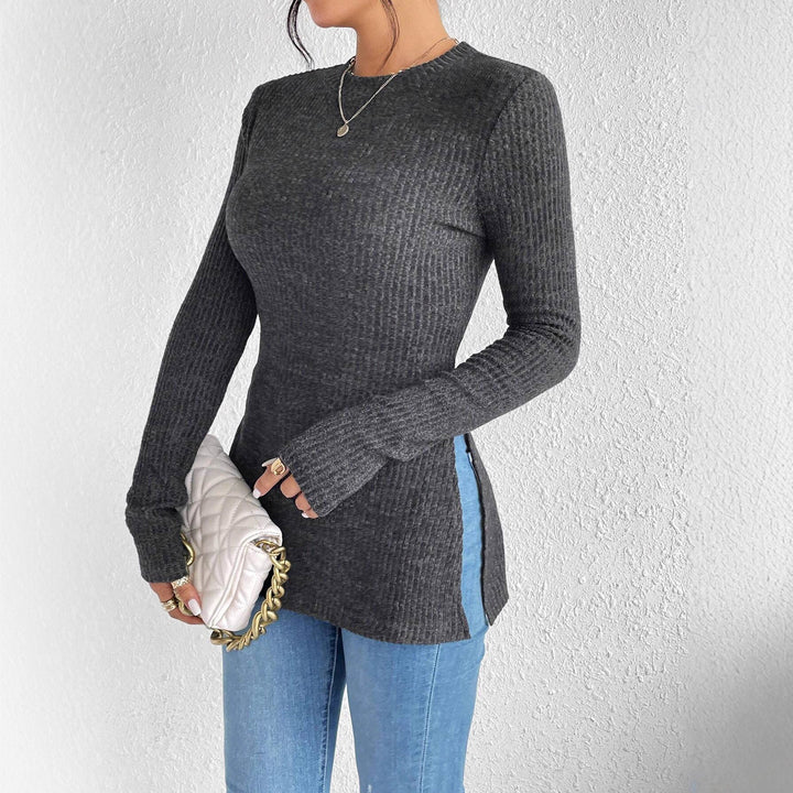 Damen Gerippter Taillierter Feinstrick-Pullover mit Stehkragen, langen Ärmeln und Seitenschlitzen Echoarchiv