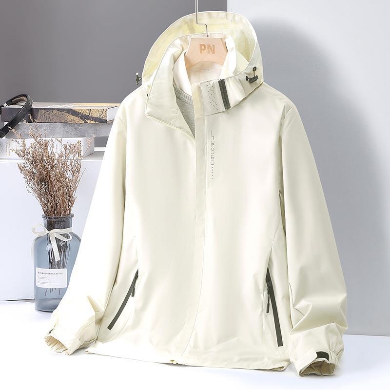 Damen Leichte Softshell-Kapuzenjacke mit winddichter Sturmleiste und verdeckten Reißverschlusstaschen – Célinea